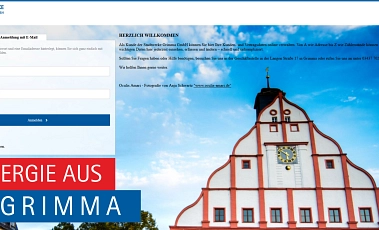 Kundenportal_EnergieausGrimma Der Giebel des historischen Rathauses zu Grimma mit klarem Himmel im Hintergrund